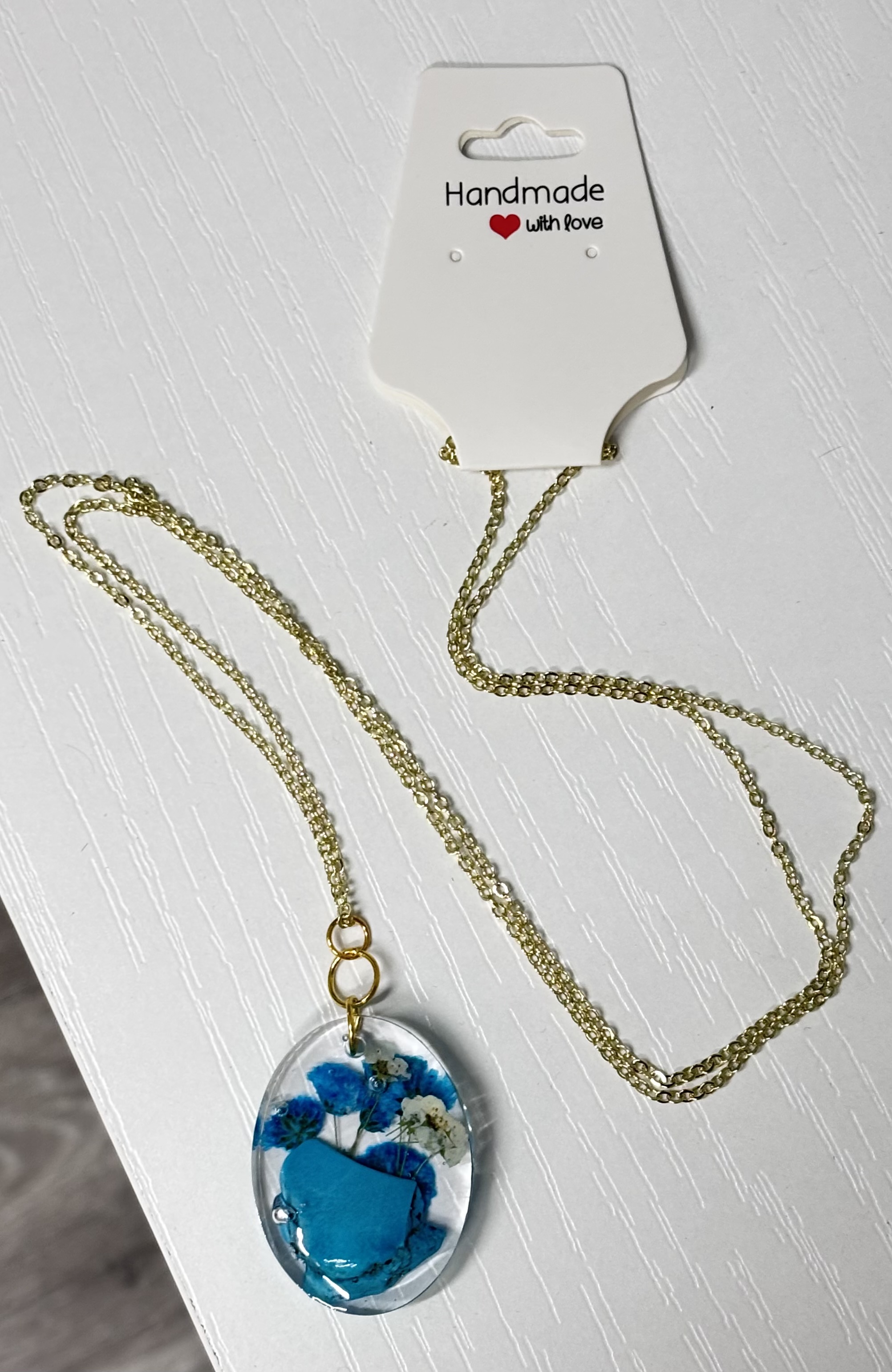 Blue floral resin necklace