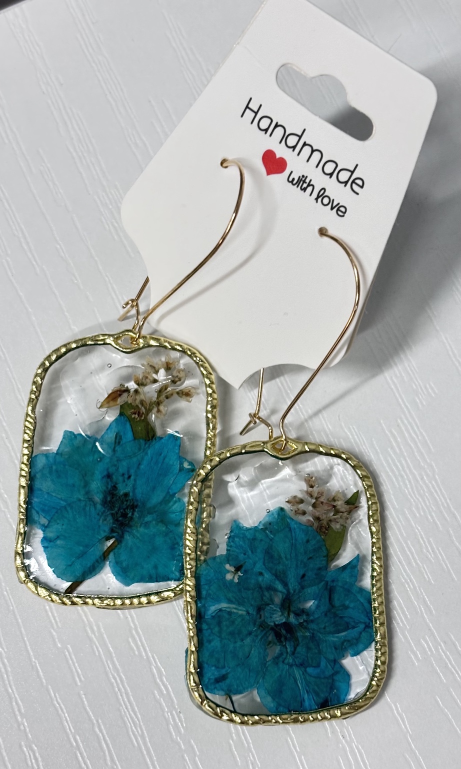 Blue floral resin earrings